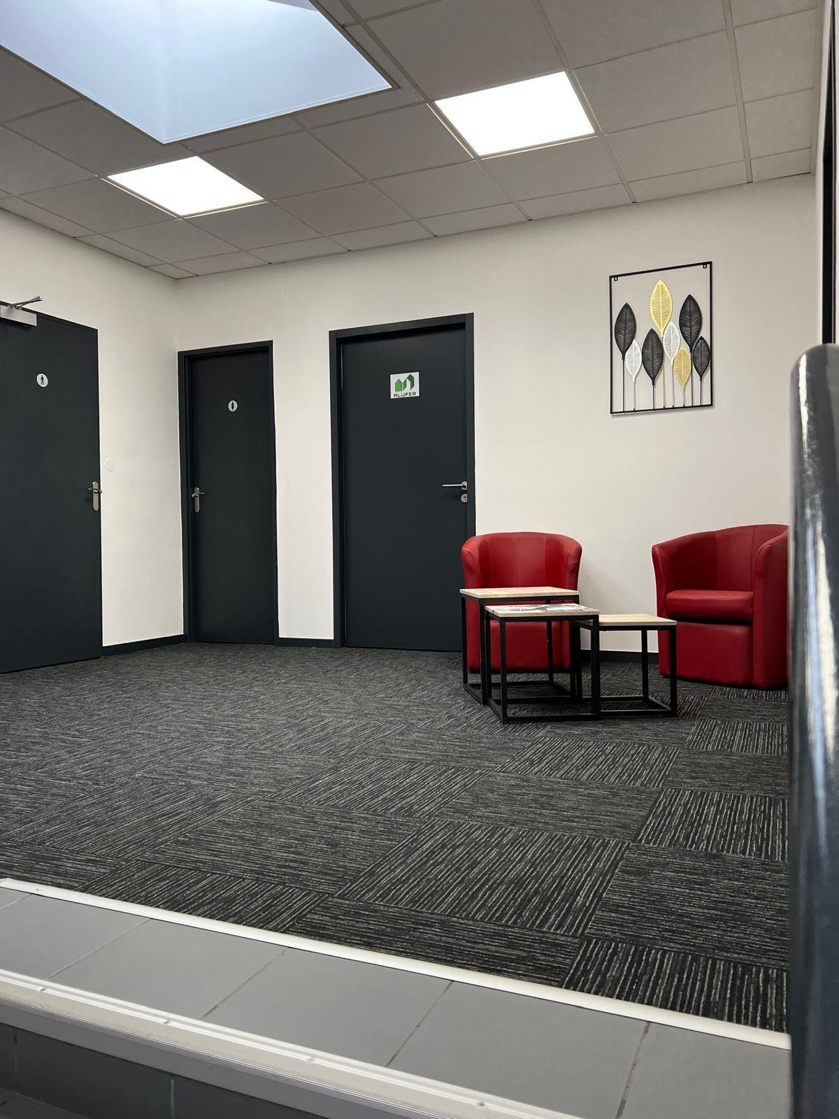 Interior renovation with yellow wall and painting supplies